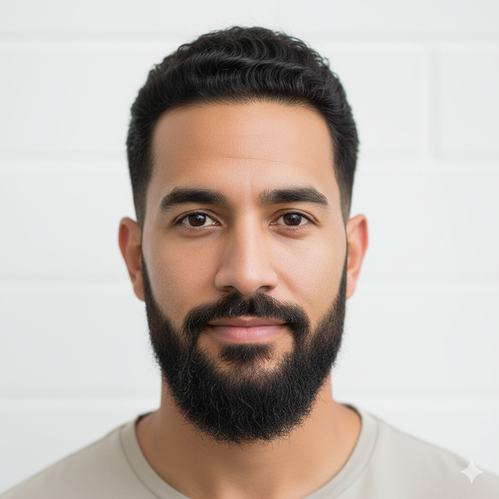 Mixed-heritage man with short even beard